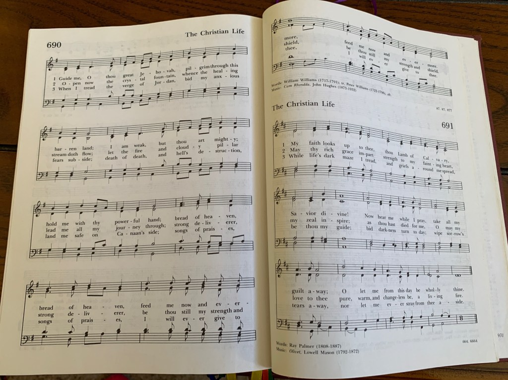 Hymnal open to Guide Me, O Thou Great Jehovah