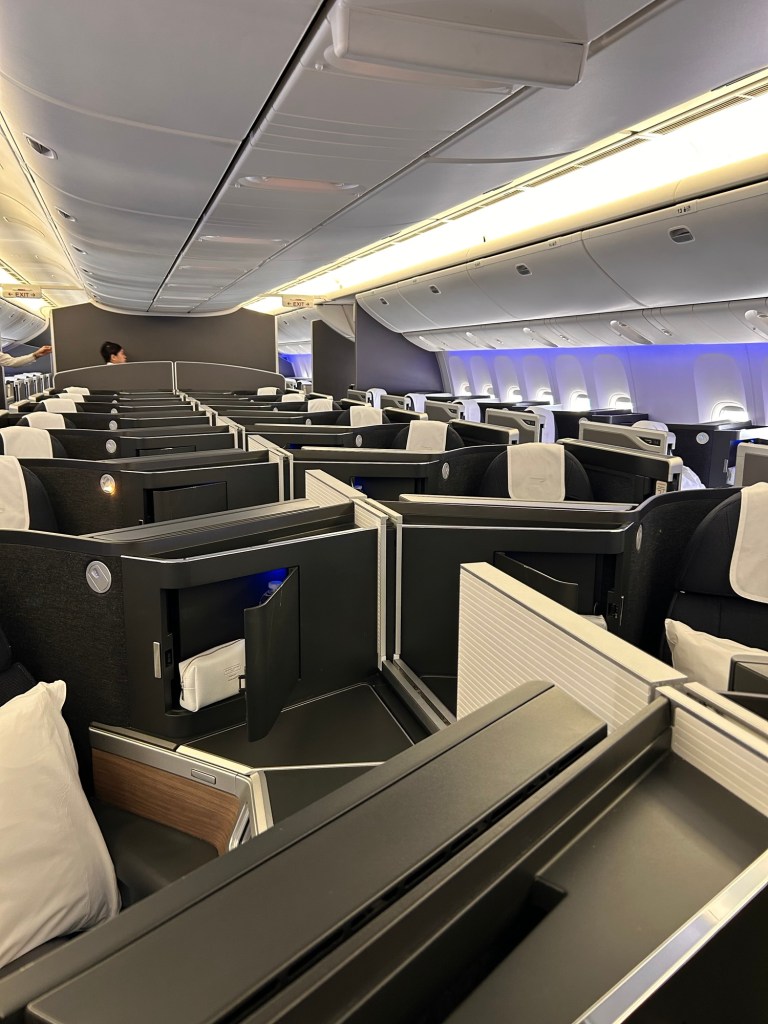 Business class cabin on BA showing eight rows of four-across “suites”.